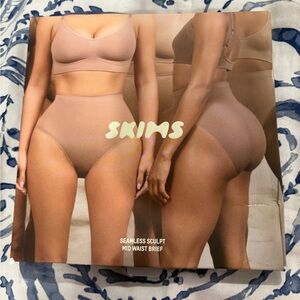 SKIMS Seamless Sculpt Mid Waist Brief in Onyx